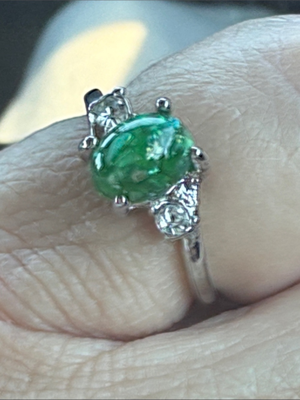 Interesting Woman’s Green Gemstone Ring flanked by two clear stones Size 6.5